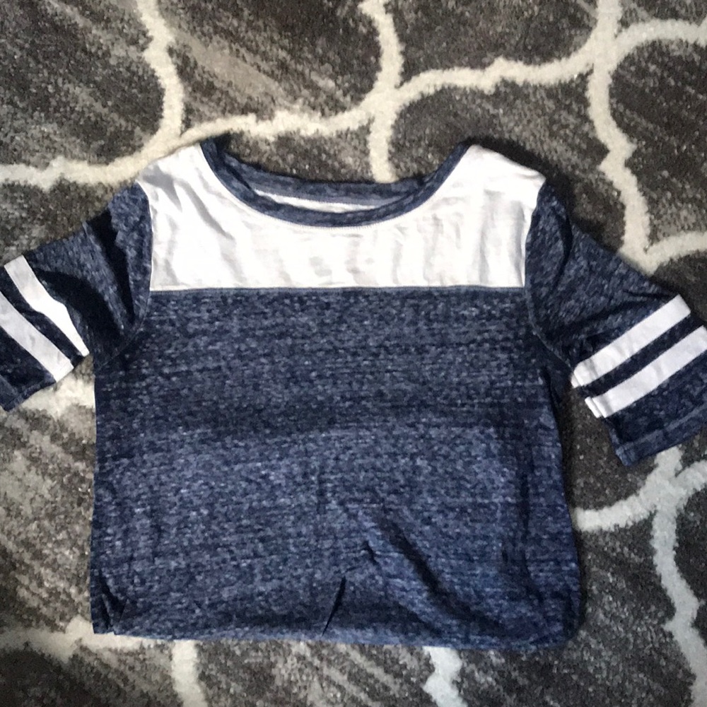 blue sporty shirt lines across sleeve